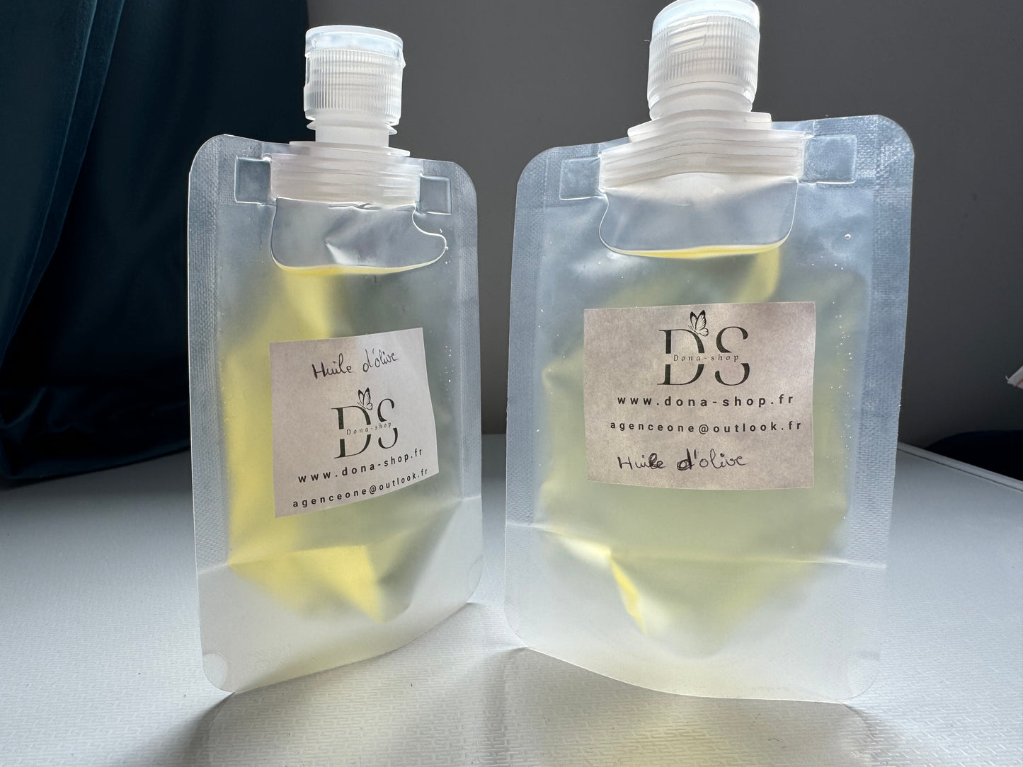 Huile d’olive (cheveux, corps et visage )