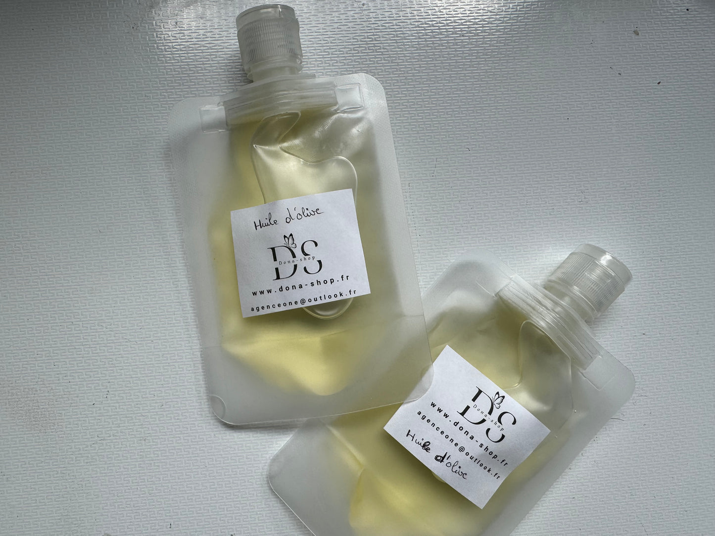 Huile d’olive (cheveux, corps et visage )